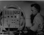 Lowry AFB PMEL School, 1963; Andre Grabel Measuring Pellet Speed.  [G. Blood]